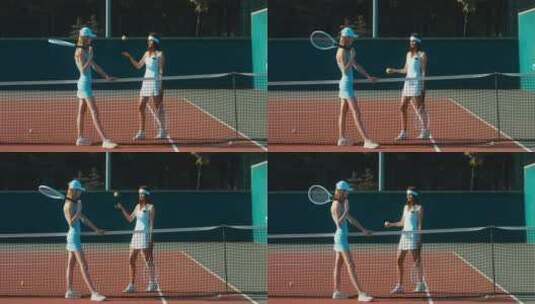 女孩在网球场聊天的特写高清在线视频素材下载