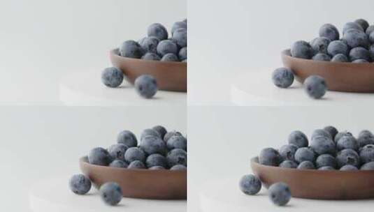 移镜拍摄碗里的酸甜蓝莓高清在线视频素材下载