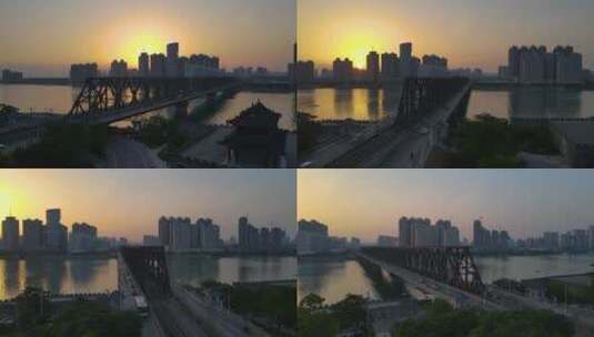 夕阳黄昏下的城市桥梁江面古建筑大气航拍高清在线视频素材下载