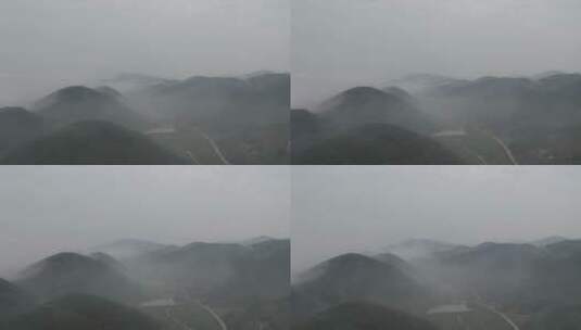 雨雾中的森林山峰小镇村庄高清在线视频素材下载