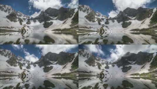 云朵下的雪山湖水高清在线视频素材下载