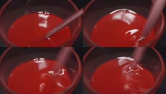 搅拌溶解西瓜汁草莓汁红色果汁高清在线视频素材下载