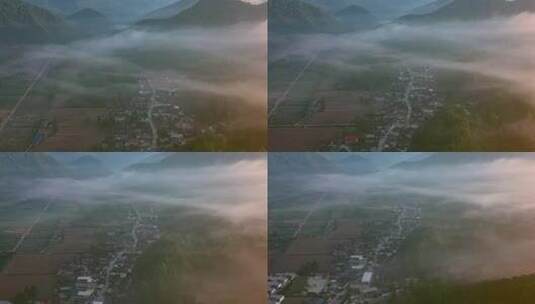 航拍早晨云雾下的村庄高清在线视频素材下载