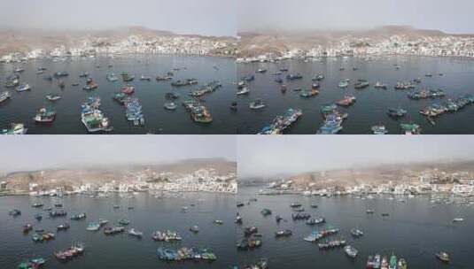 夏季用无人机拍摄普库萨纳海岸的渔船和海滨别墅高清在线视频素材下载