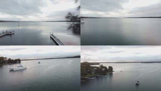 拍摄湖泊和船只高清在线视频素材下载