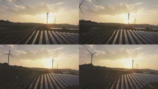 夕阳下风力发电场和太阳能光伏发电站航拍高清在线视频素材下载