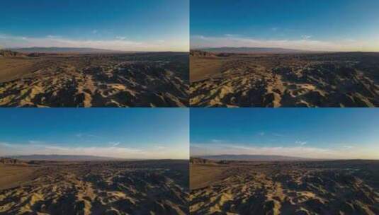夕阳下沙漠航拍延时光影变化高清在线视频素材下载