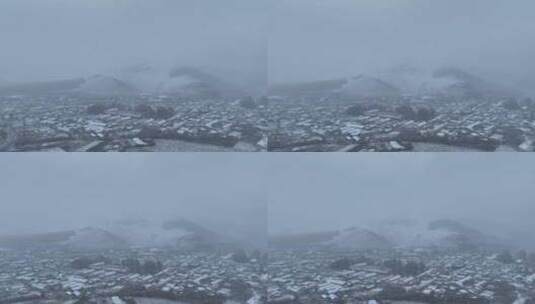 航拍风雪交加的山村高清在线视频素材下载