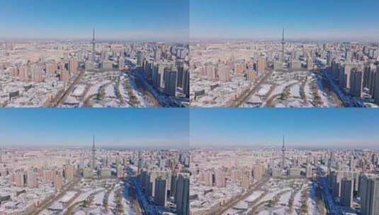 中国黑龙江哈尔滨龙塔城市雪景航拍高清在线视频素材下载