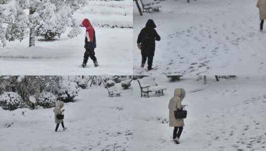雪地中的行人高清在线视频素材下载