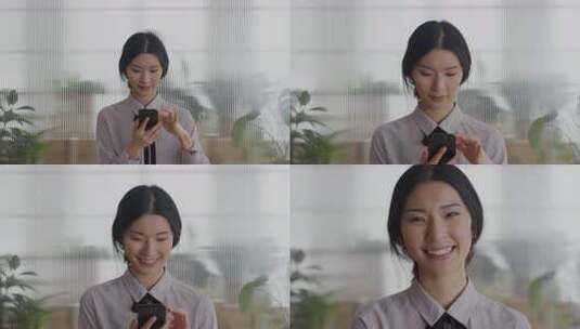 职场女性专注看手机画面高清在线视频素材下载