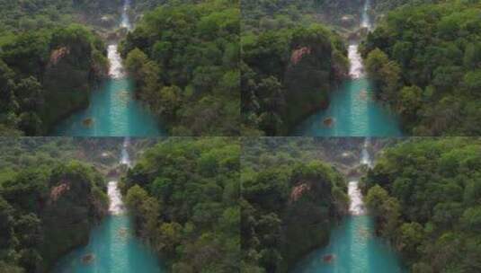 航拍树林中的瀑布高清在线视频素材下载