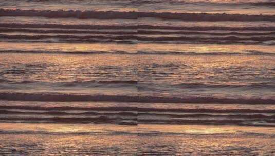 落日余晖映照的海面波浪高清在线视频素材下载
