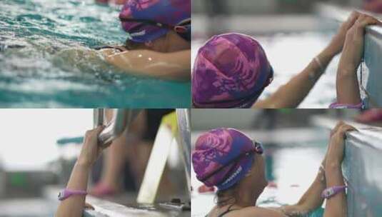 游泳馆里的比赛女人爬上岸高清在线视频素材下载