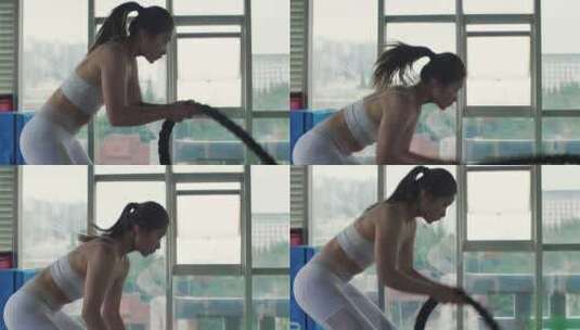 一位女青年在健身房锻炼身体高清在线视频素材下载