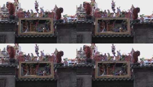 广州陈家祠古建屋顶上的彩色石雕高清在线视频素材下载