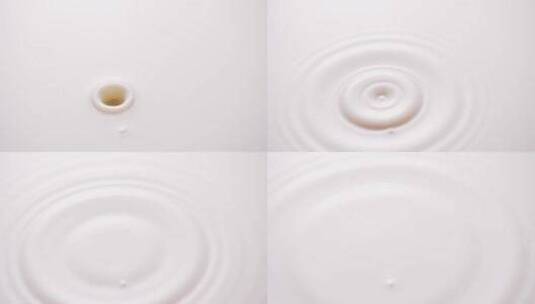 牛奶滴落液面唯美素材慢镜头高清在线视频素材下载