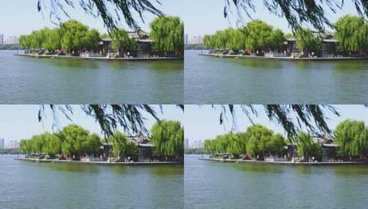 山东济南大明湖公园景区湖面景色与游船游客高清在线视频素材下载