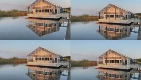 夕阳苏州同里湿地公园旁的民宿水上建筑横版高清在线视频素材下载