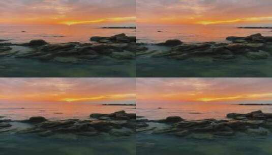 竖屏海边日落礁石海浪阳光唯美高清在线视频素材下载