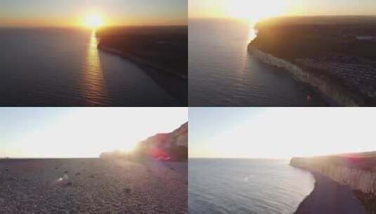 海滨小城海面夕阳日落悬崖航拍高清在线视频素材下载