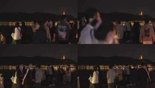 杭州西湖夜晚的游客高清在线视频素材下载