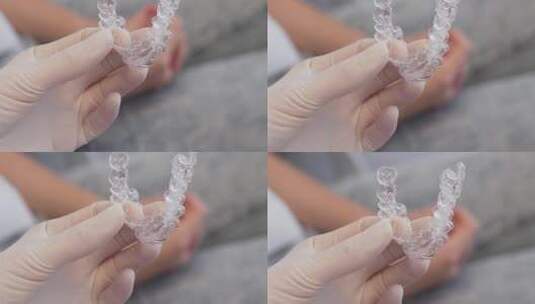 医生讲解可拆卸塑料牙套高清在线视频素材下载