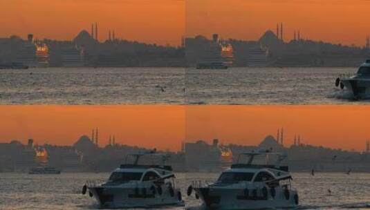 日落时观看博斯普鲁斯海峡（伊斯坦布尔）和埃米诺努1高清在线视频素材下载