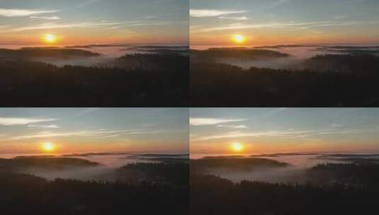 无人机拍摄了华盛顿惠德贝岛被浓雾包围的山峰。高清在线视频素材下载