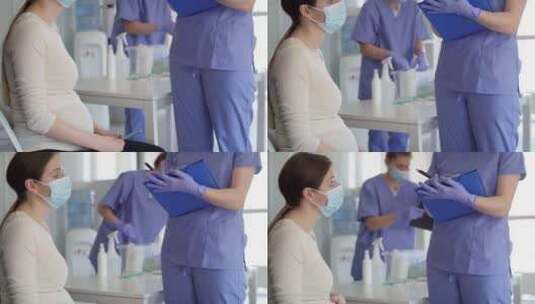 孕妇接种疫苗前戴口罩的倾斜视频。用红色氦气相机在8K拍摄。高清在线视频素材下载