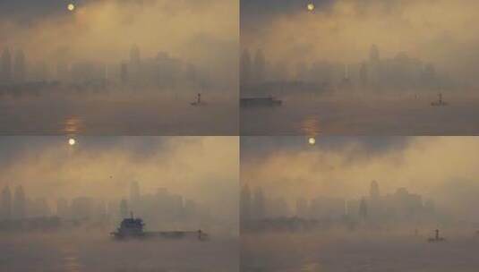 实拍长江边晨雾中的日出高清在线视频素材下载