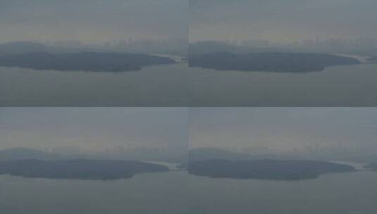 航拍武汉东湖山湖面清晨雾气高清在线视频素材下载
