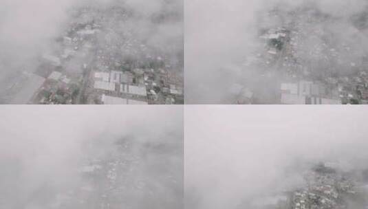 危地马拉市郊区云层上方的航拍镜头。高清在线视频素材下载