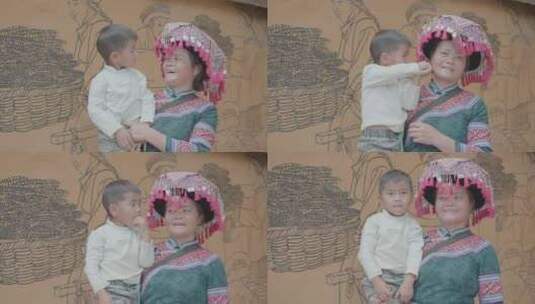 乡村振兴云南苗族妇女小孩微笑升格视频高清在线视频素材下载