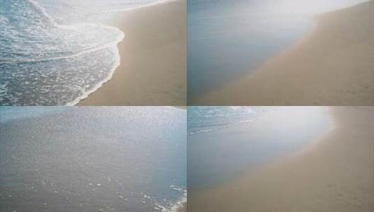 【4k】阳光海浪拍打在沙滩上特写高清在线视频素材下载