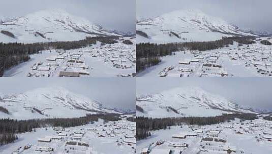 航拍新疆禾木雪景森林雪地小木屋禾木桥雪山高清在线视频素材下载