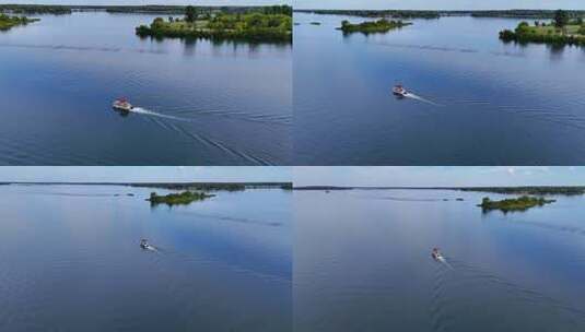 湖面小船行驶俯瞰画面高清在线视频素材下载