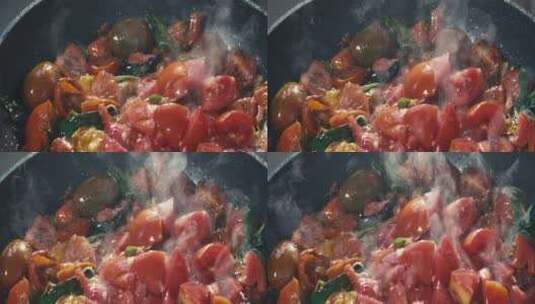 樱桃番茄和其他蔬菜在锅里炖高清在线视频素材下载