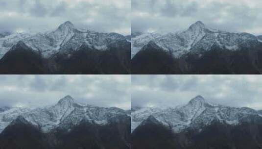 阴雨天的雪山天际线景观高清在线视频素材下载