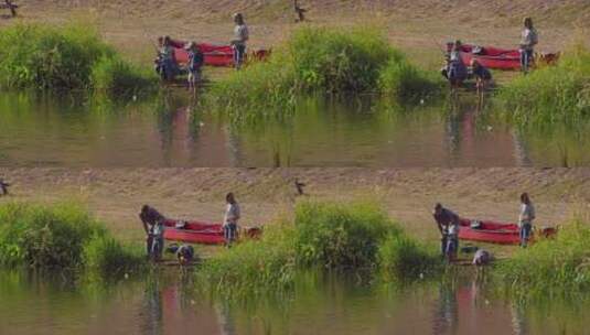 爸爸教女儿钓鱼小男孩下到水里高清在线视频素材下载