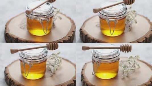 一罐装满蜂蜜的玻璃罐高清在线视频素材下载