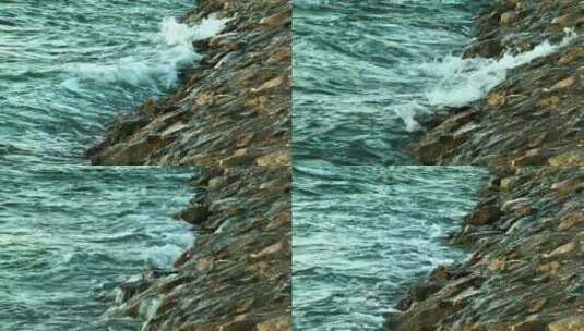 被海浪撞击的岩石表面高清在线视频素材下载