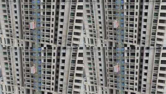 俯视建筑工地施工电梯高楼大厦钢筋混凝土高清在线视频素材下载