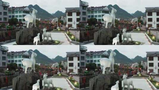 磐安双峰大皿羊氏聚居地广场雕塑 航拍高清在线视频素材下载