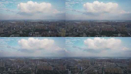 航拍蓝天白云天空云朵下城市居民区建筑高清在线视频素材下载