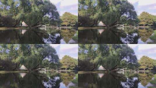 湖水中帐篷树木倒影高清在线视频素材下载
