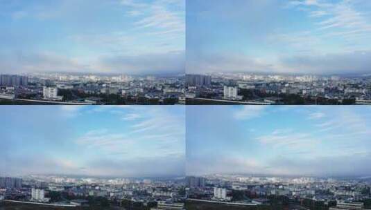 蓝天云雾中的小城高清在线视频素材下载
