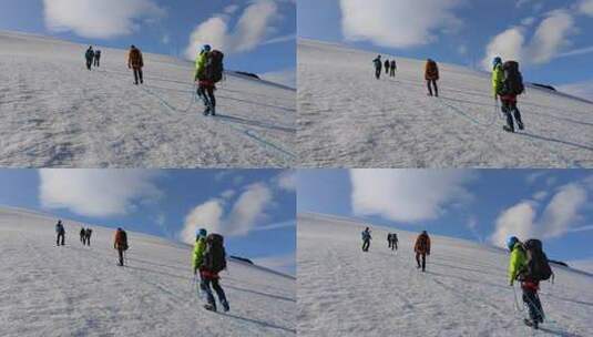 攀登沙鲁里山脉尼登贡嘎雪山冰川上的登山者高清在线视频素材下载