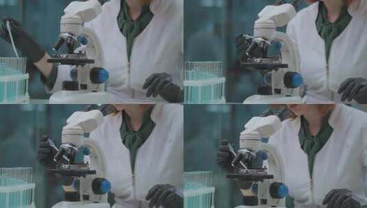 女科学家使用显微镜在测试试剂样本高清在线视频素材下载