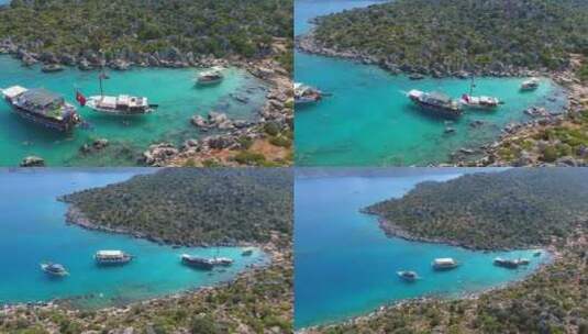 潜水旅游船停泊在土耳其的一个小海湾和游客度假者在海里游泳高清在线视频素材下载